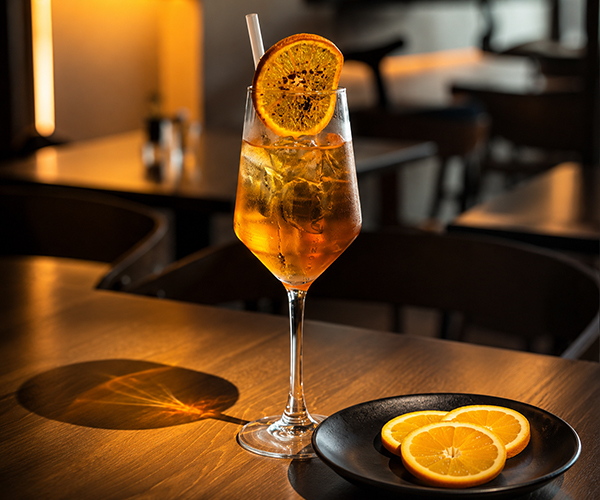 Hollywood Sunset signature cocktail with Cappelletti and orange