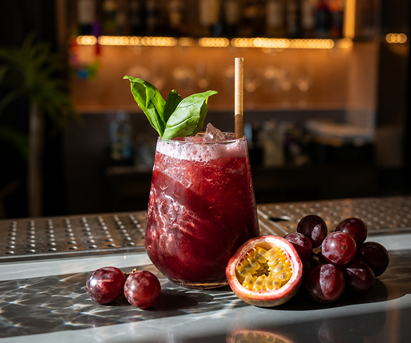 Sangria Spritz cocktail with passion fruit and lemon